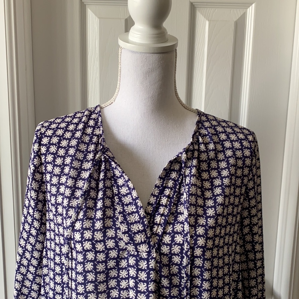 Navy and white with a tie at the neck